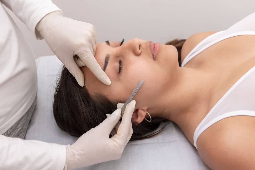 Photo of a woman receiving dermaplaning